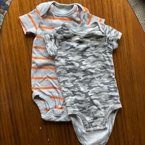 Set of Child of Mine onesies